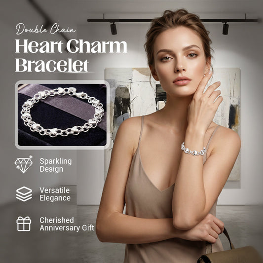 📢📢 50 % RABATT !! ⏰ Hjärtcharm-armband med dubbelkedja – diskret elegans, perfekt att bära ensam eller stapla med andra smycken 🌸
